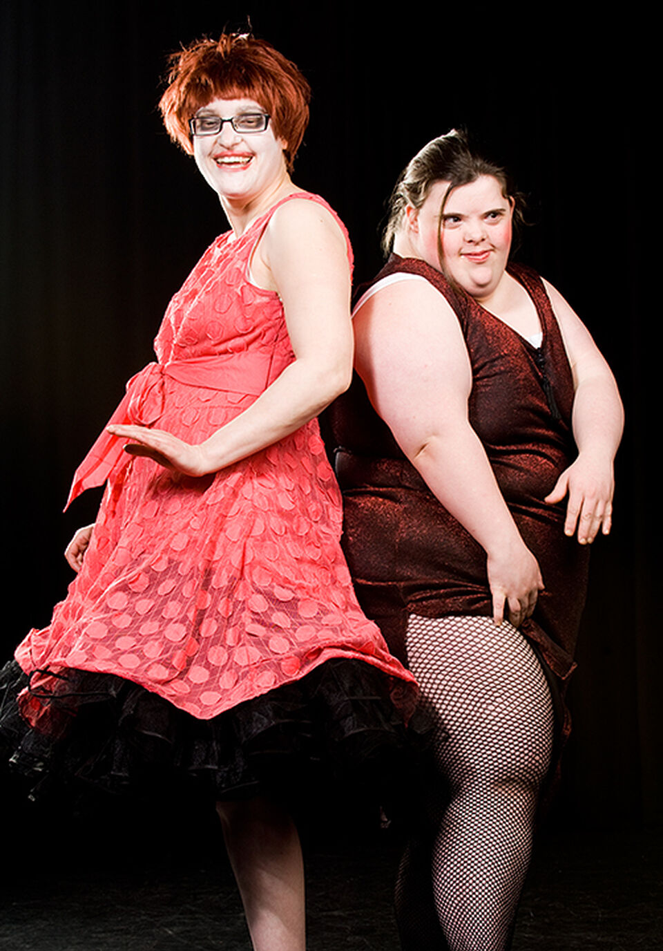 A photo of two actors during a performance of "Dark Inc"