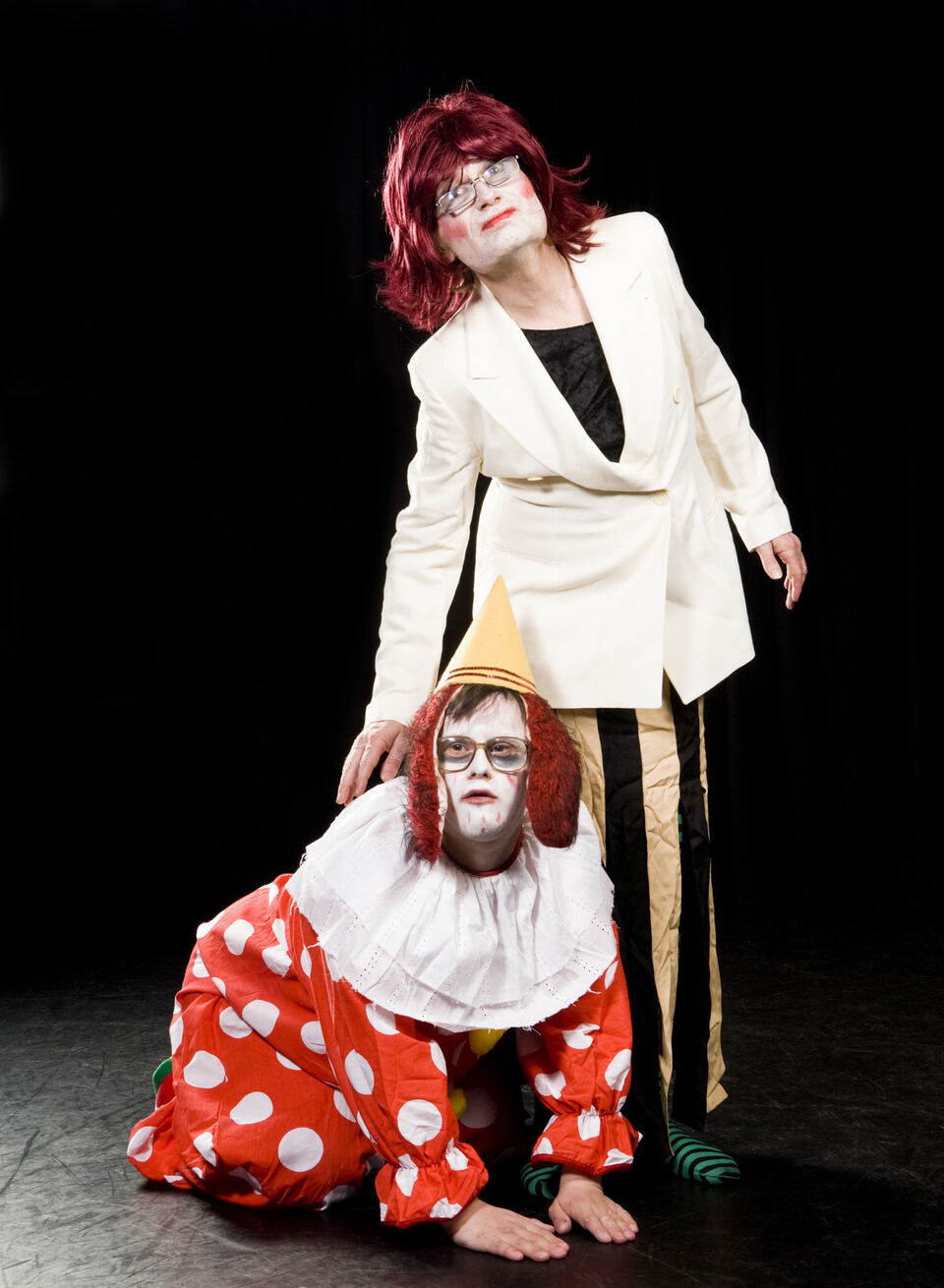 A photo of two actors during a performance of "Dark Inc"