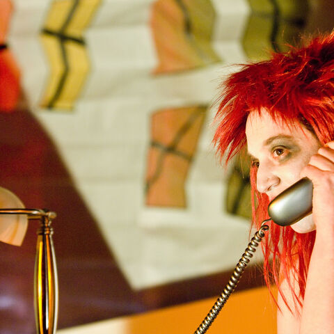 A photo of an actor during a performance of "Dark Inc"