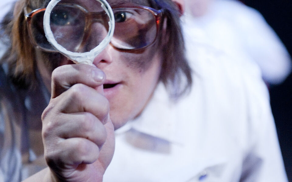 An actor in a performance of "Feeble Minds"