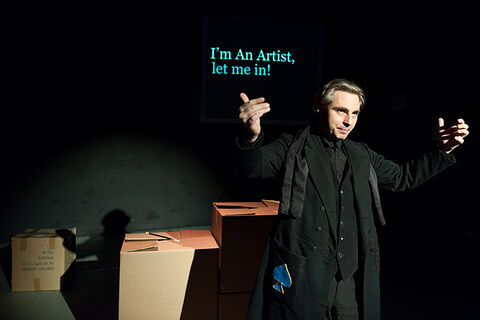 Photo of two dancers on stage during a performance of "I'm An Artist Let Me In!"