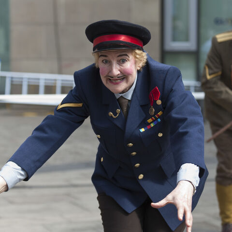 A photo of an actor during a performance of "Trojan Women"