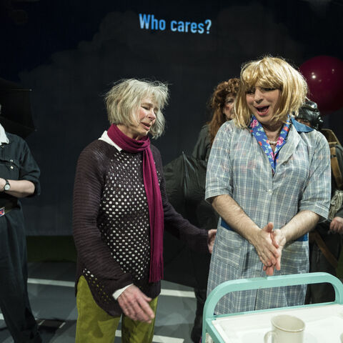 Actors on stage in a production of "SAFE"