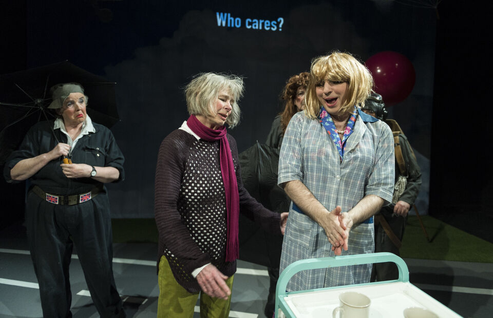 Actors on stage in a production of "SAFE"