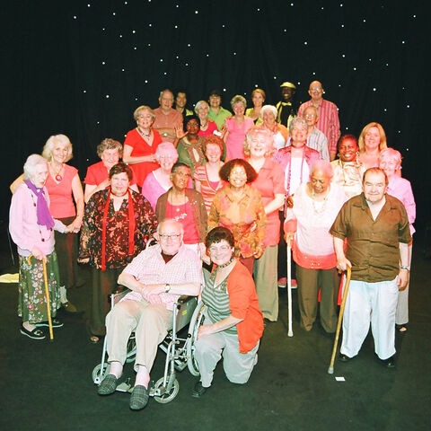 Group photo of "What's in it For Me?" performers on stage