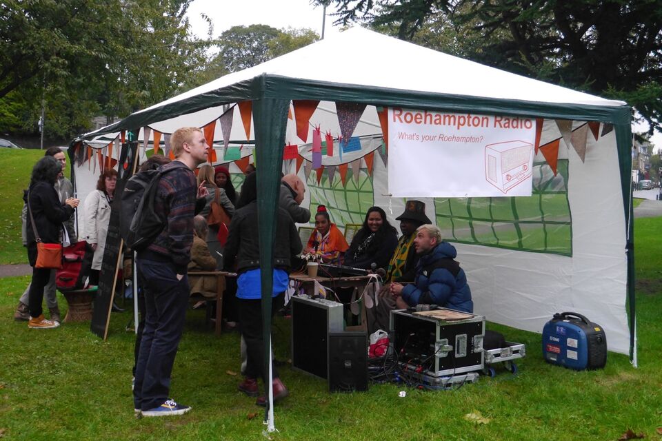 Spare Tyre participants at a stall for the radio project